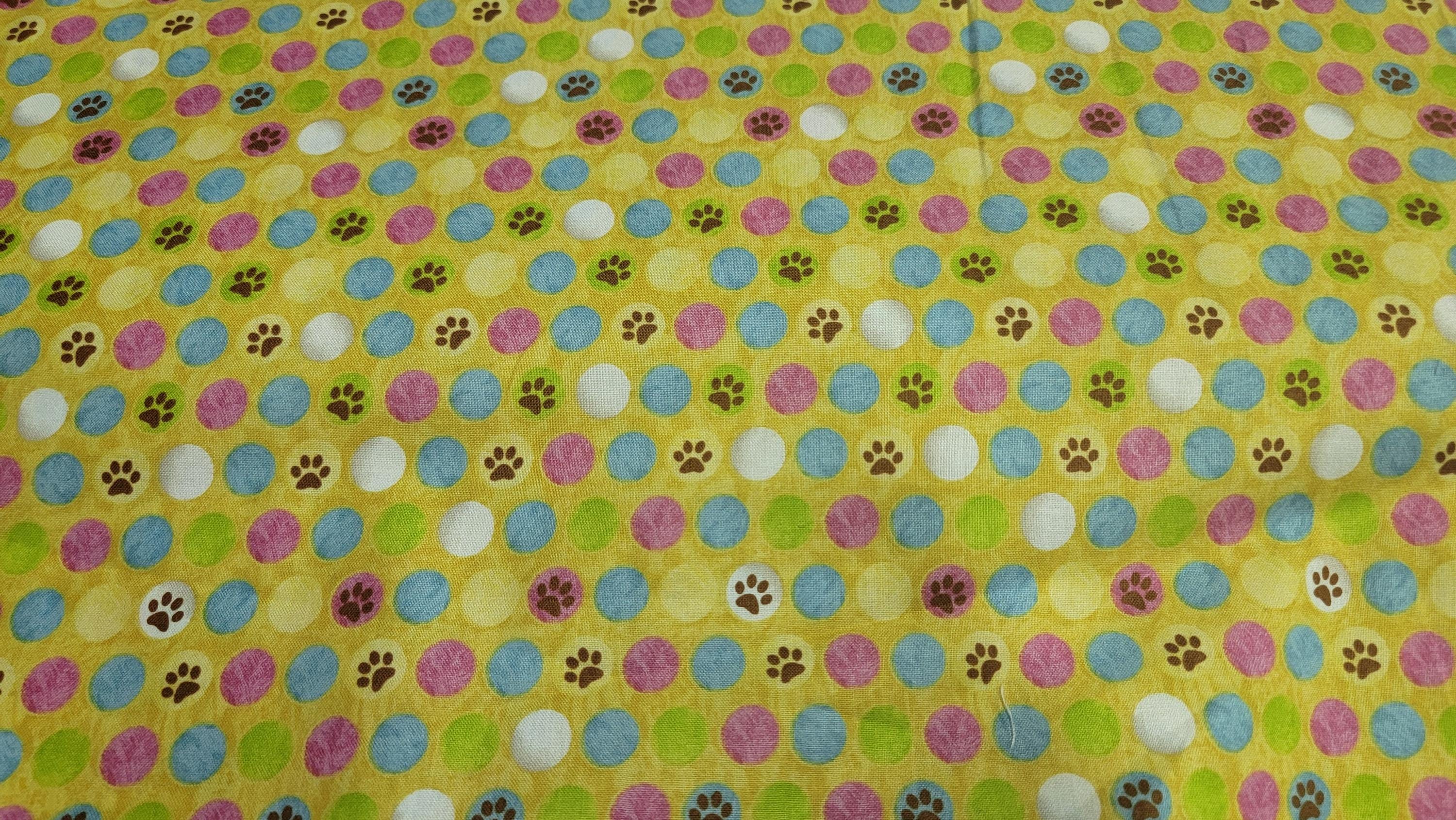 Cozy Kitties Paw Prints Yellow Background Quilt Fabric by QT Fabrics