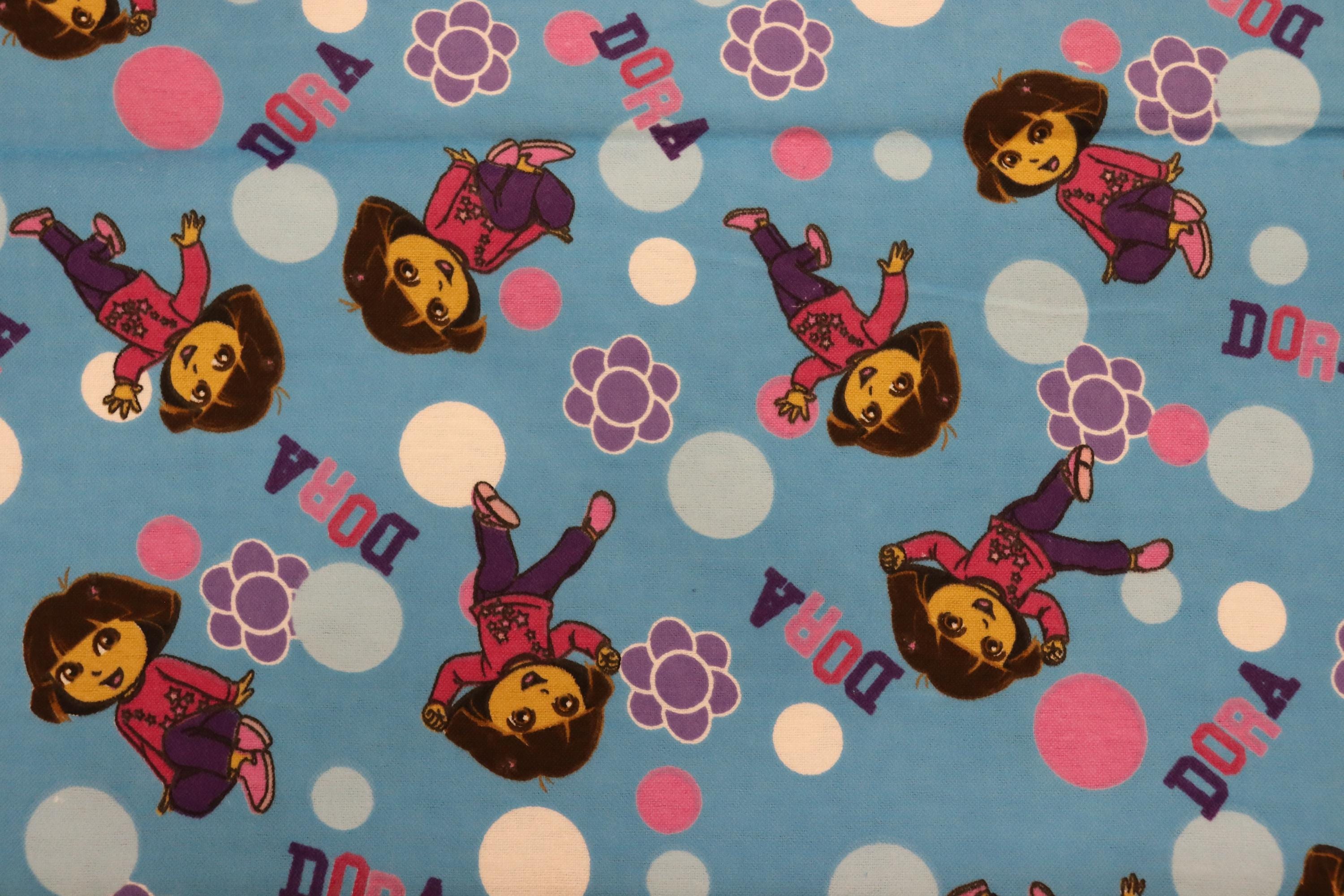 Dora the Explorer Floral Toss Cotton Flannel By Springs Creative Fabrics