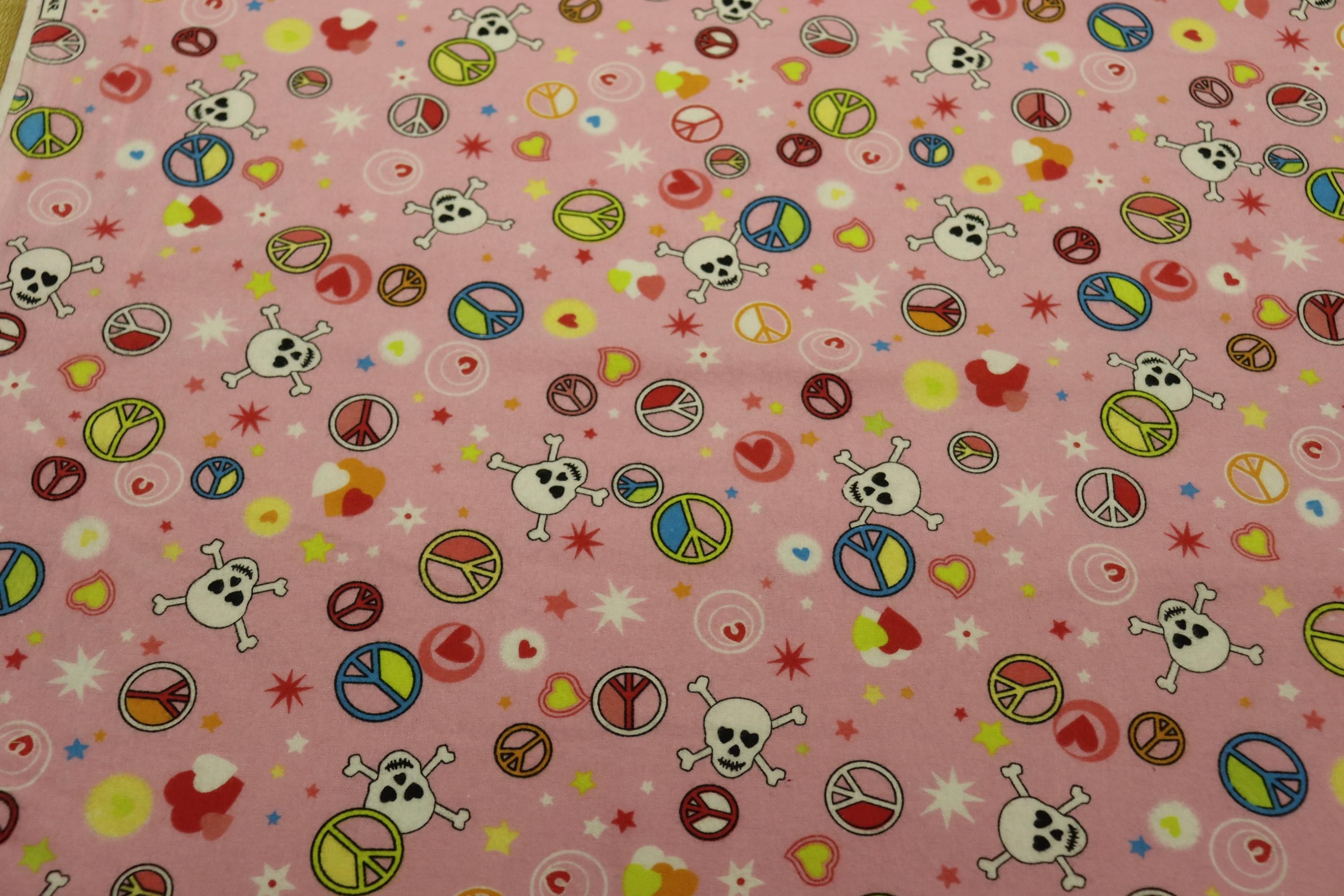 Pink Peace Signs and Skulls Flannel Fabric