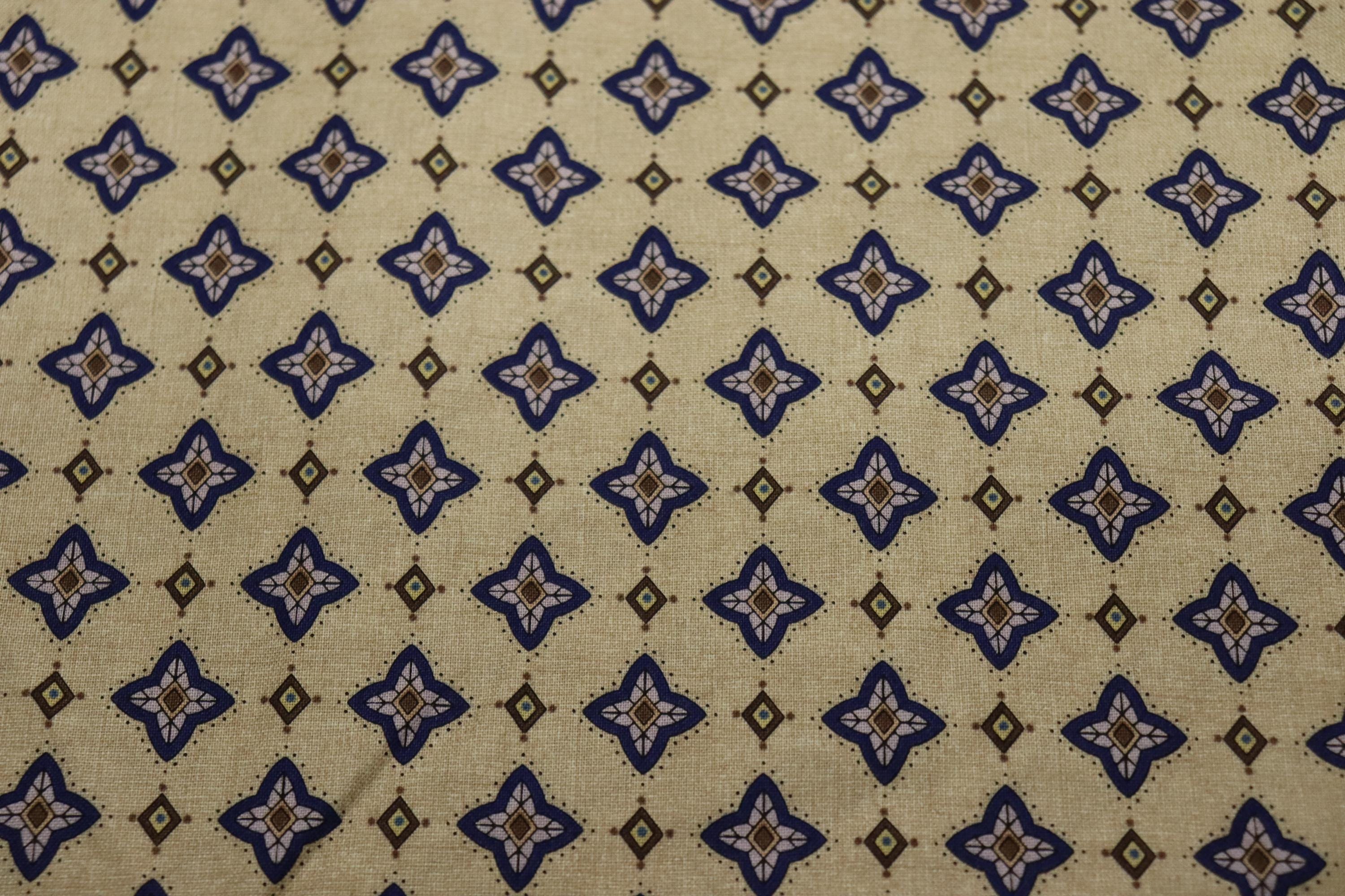 Silent Flight Tan Background Quilt Fabric By QT Fabrics