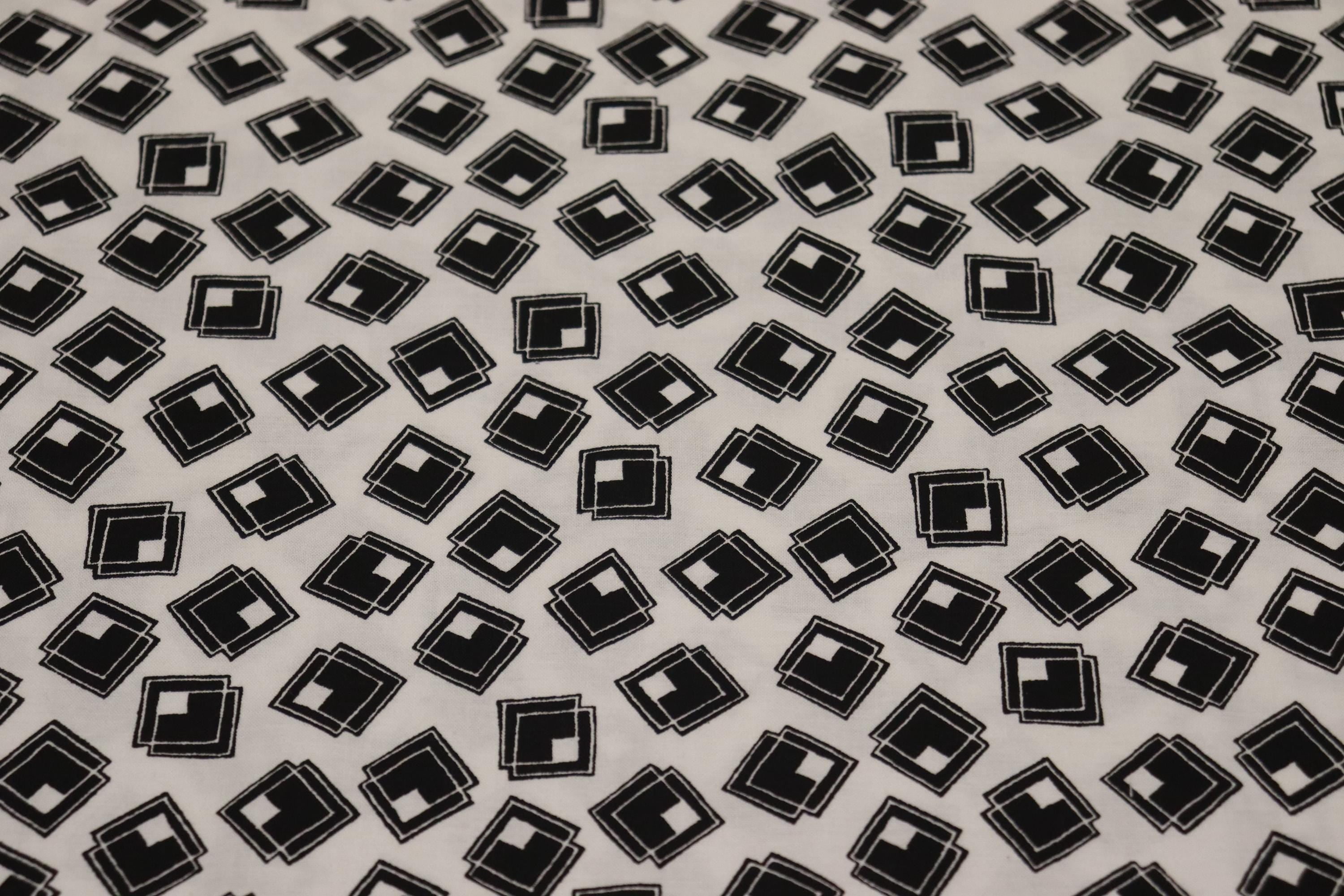 White Background with Black Squares Quilt Fabric By Choice Fabrics