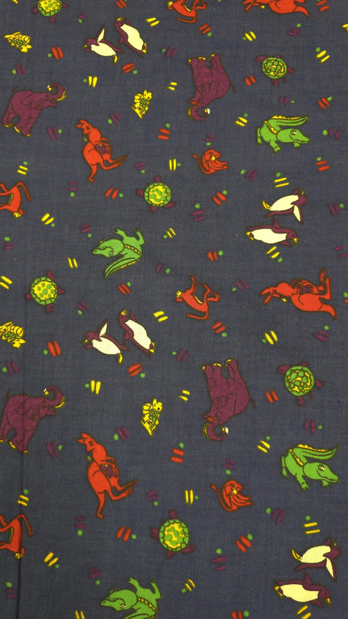 Bright colored Monkey, Elephants, Crocodiles, Etc on a Dark Blue Background fabric