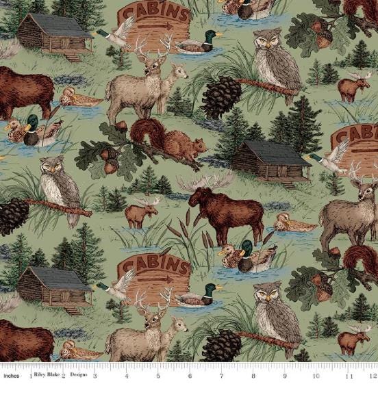 Whispering Pines Forest Animals Main Green Quilt Fabric By Riley Blake Designs.